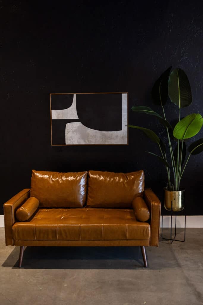 Chic leather couch in an event studio setting.